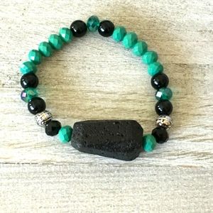 Black lava rock on radiant green bracelet
